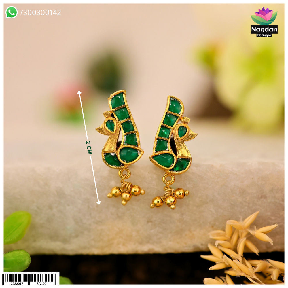 Nandan Shringar Mayurakrit kundal earrings with panna stones, traditional gold-toned jewelry for festive or special occasions.