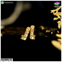 Makrakrit jadaau kundal by Nandan Shringar featuring intricate design with traditional Heera kundan embellishments.