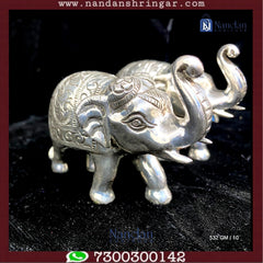 One pair of fine silver elephant figurines by Utsav Arts, showcasing intricate detailing and craftsmanship.