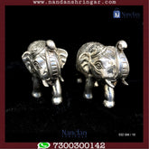 One pair of fine silver elephant earrings by Utsav Arts, showcasing intricate design and craftsmanship.