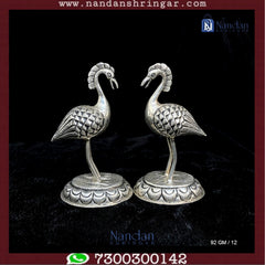 One pair of fine silver earrings from Utsav Arts, featuring intricate design and elegant craftsmanship.