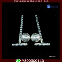 Fine silver Gend Chadi from Utsav Arts, featuring intricate design and craftsmanship, displayed on a textured background.