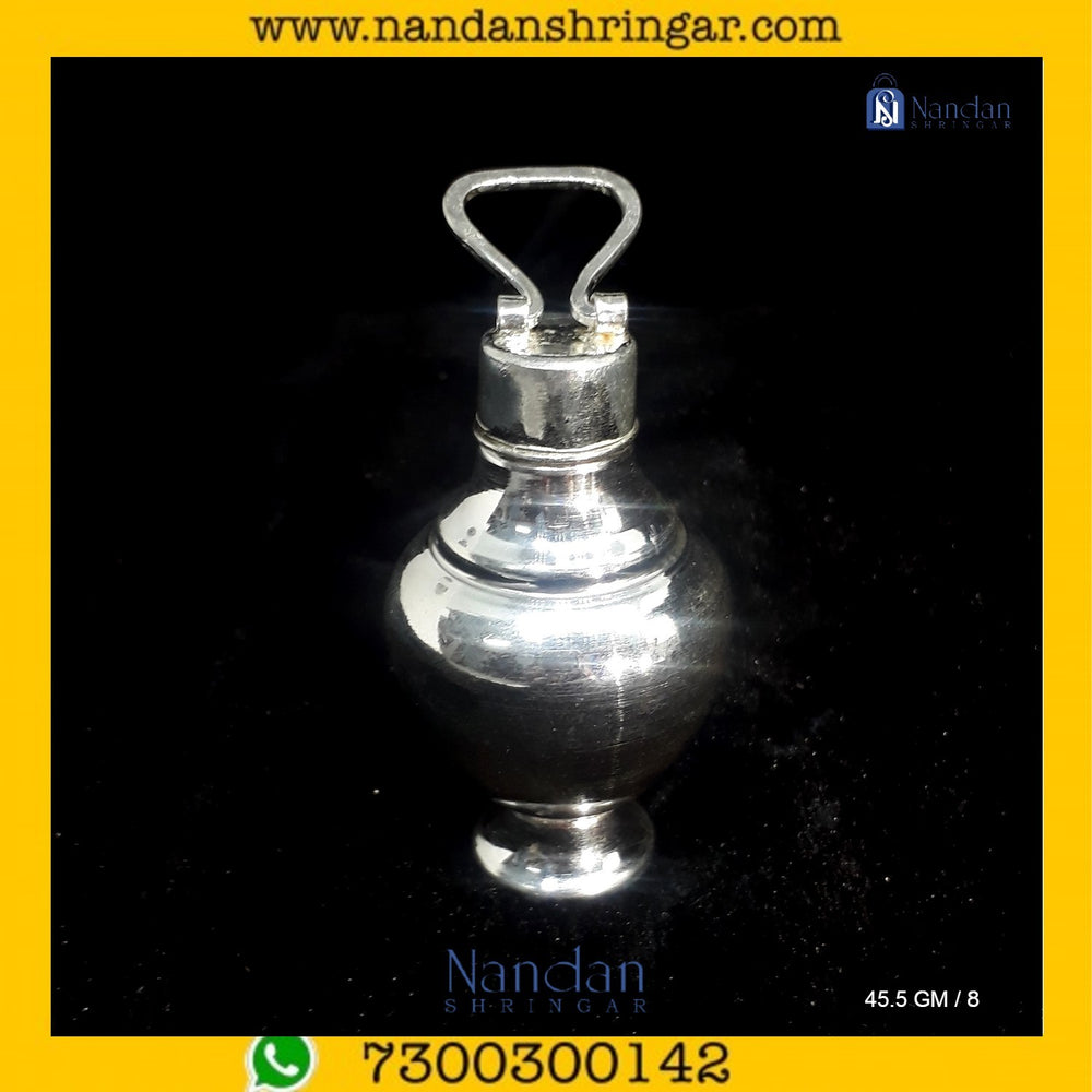 Fine silver Kunja ornament from Utsav Arts, showcasing intricate design details and craftsmanship.