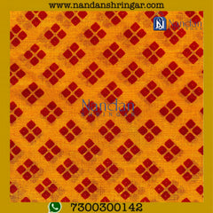 Orange Choufuli Vastra by nandanshringars, featuring intricate design and vibrant color, displayed elegantly.