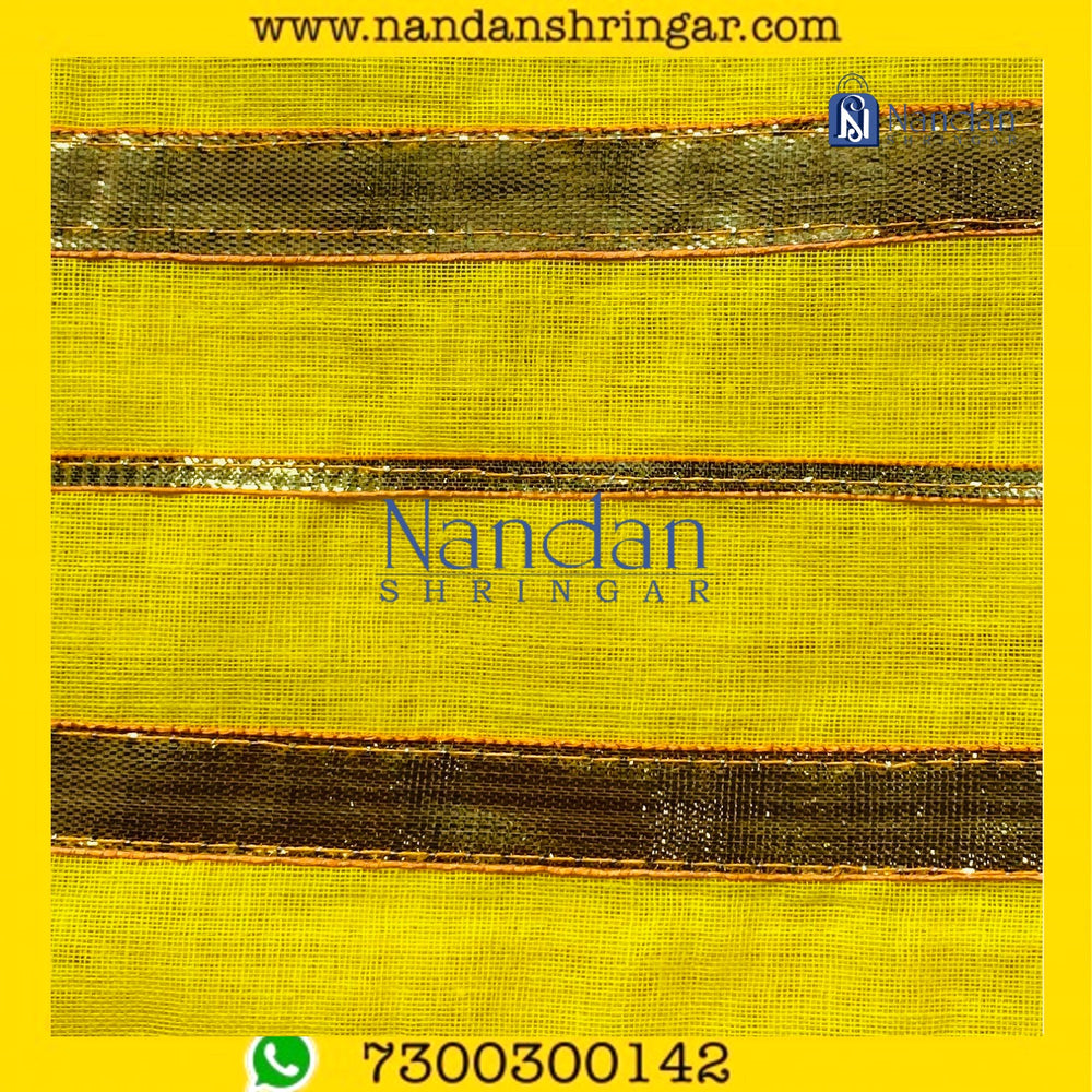 Yellow Dhora Wala Special Zari Vastra by Nandanshringars, showcasing intricate zari work and vibrant color.