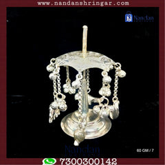 Fine silver Chak Dol from Utsav Arts, featuring intricate designs and a polished finish, displayed on a neutral background.
