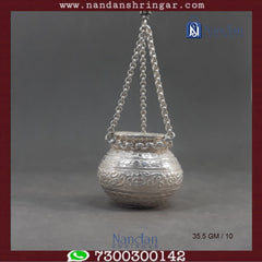 Fine silver hanging handi by Utsav Arts, featuring intricate designs and a polished finish, displayed against a neutral background.