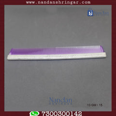 Fine silver comb by Utsav Arts, featuring intricate detailing and a sleek design, perfect for grooming and styling hair.