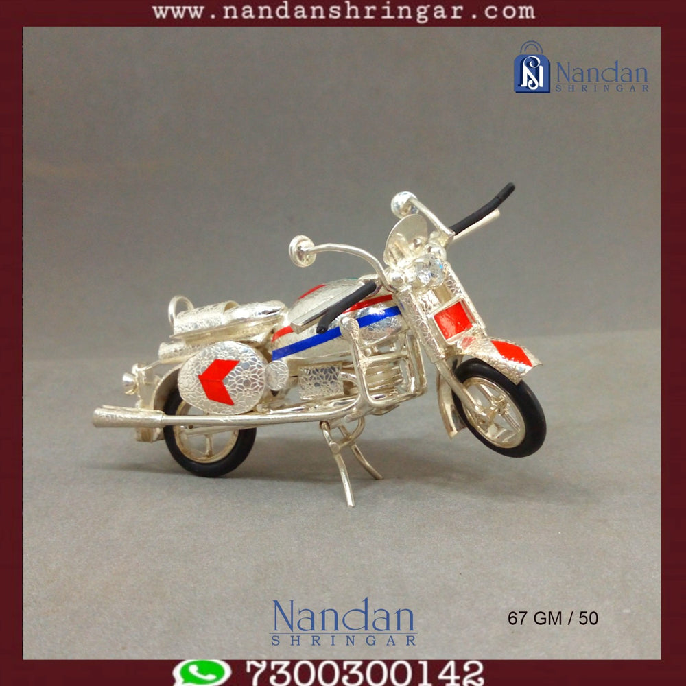 Fine silver motorcycle sculpture by Utsav Arts, showcasing intricate detailing and craftsmanship.