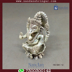 Fine silver Shree Ganesh statue by Utsav Arts, showcasing intricate details and craftsmanship, perfect for home decor.