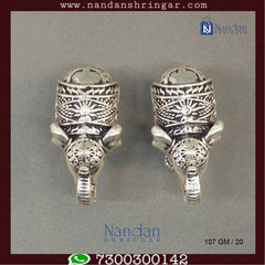Antique fine silver elephant pair by Utsav Arts, showcasing intricate detailing and traditional craftsmanship.
