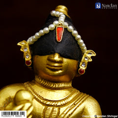 Silver Jadaau MakraKrit Kundal by nandanshringars featuring intricate design and elegant craftsmanship.