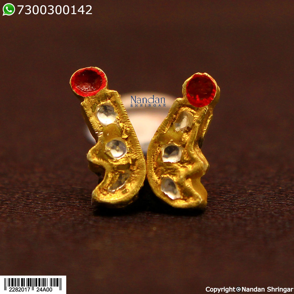 Silver Jadaau MakraKrit Kundal with Heera detailing by nandanshringars, showcasing intricate design and craftsmanship.
