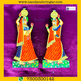 Orange Gopi Matki pair from nandanshringars featuring intricate designs and traditional craftsmanship.