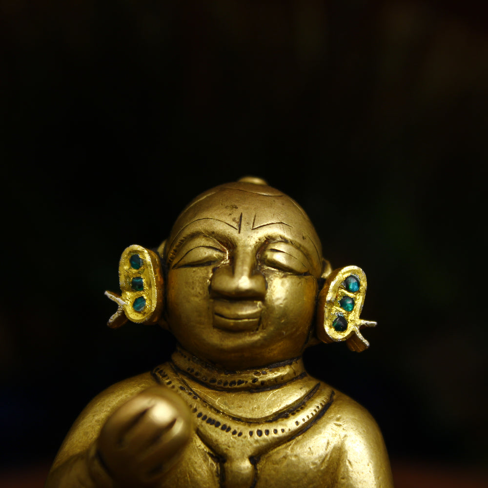 Jadaau MakraKrit Kundal in Panna color, featuring intricate silver detailing and elegant design by nandanshringars.
