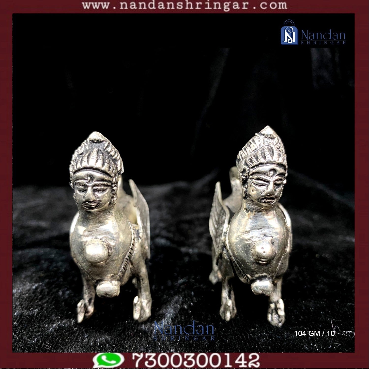Fine silver pair of Kaamdhenu cows by Utsav Arts, showcasing intricate detailing and elegant craftsmanship.