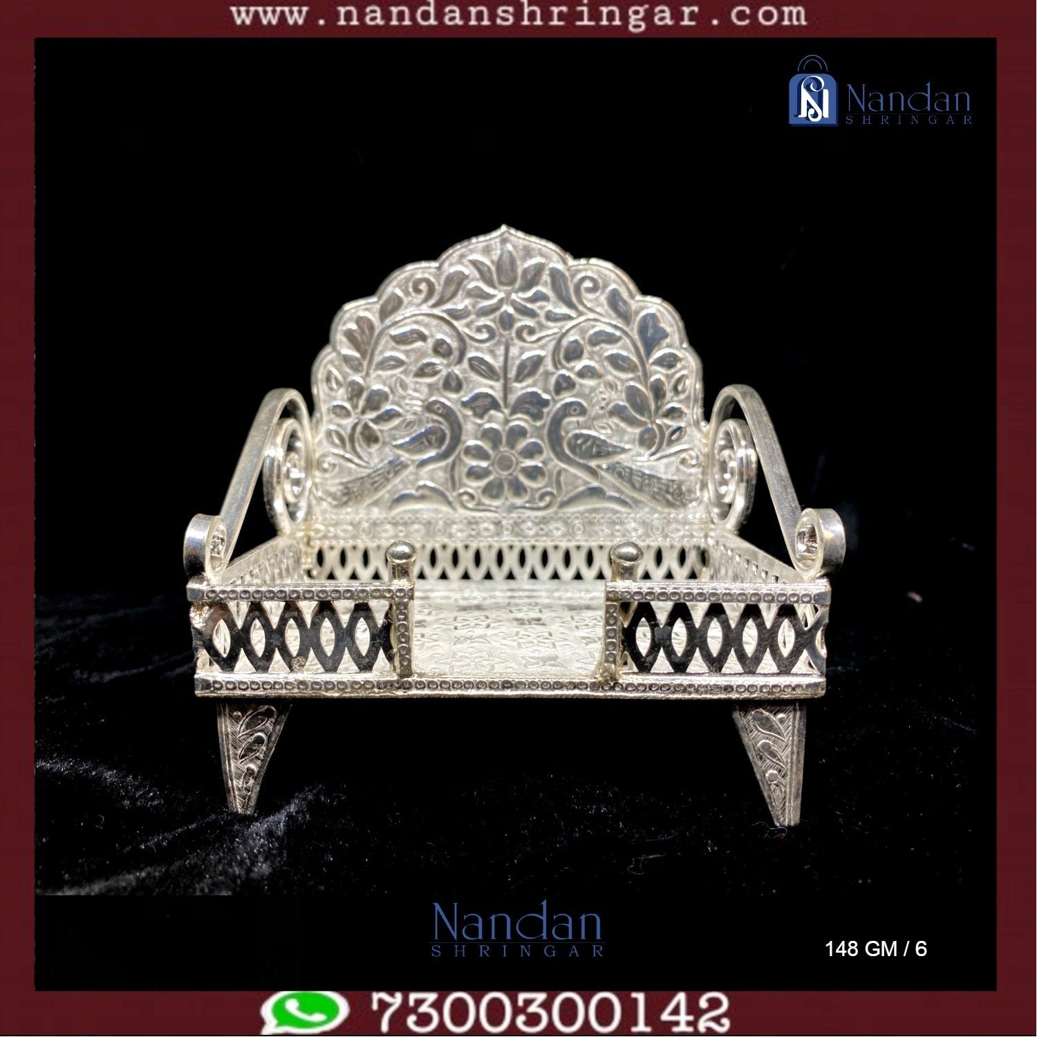 Fine silver Sinhasan by Utsav Arts, featuring intricate design and craftsmanship, showcased against a neutral background.