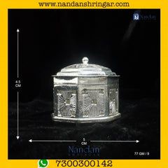 Fine silver carving of Banta Ji by Utsav Arts, showcasing intricate details and craftsmanship in a decorative design.