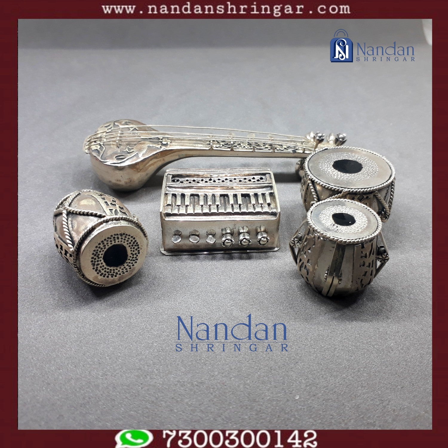 Fine silver musical set by Utsav Arts featuring intricate designs and traditional instruments displayed elegantly.