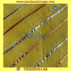 Yellow Dhora Wala Doriya Special Zari Vastra by nandanshringars, showcasing intricate zari details and vibrant color.