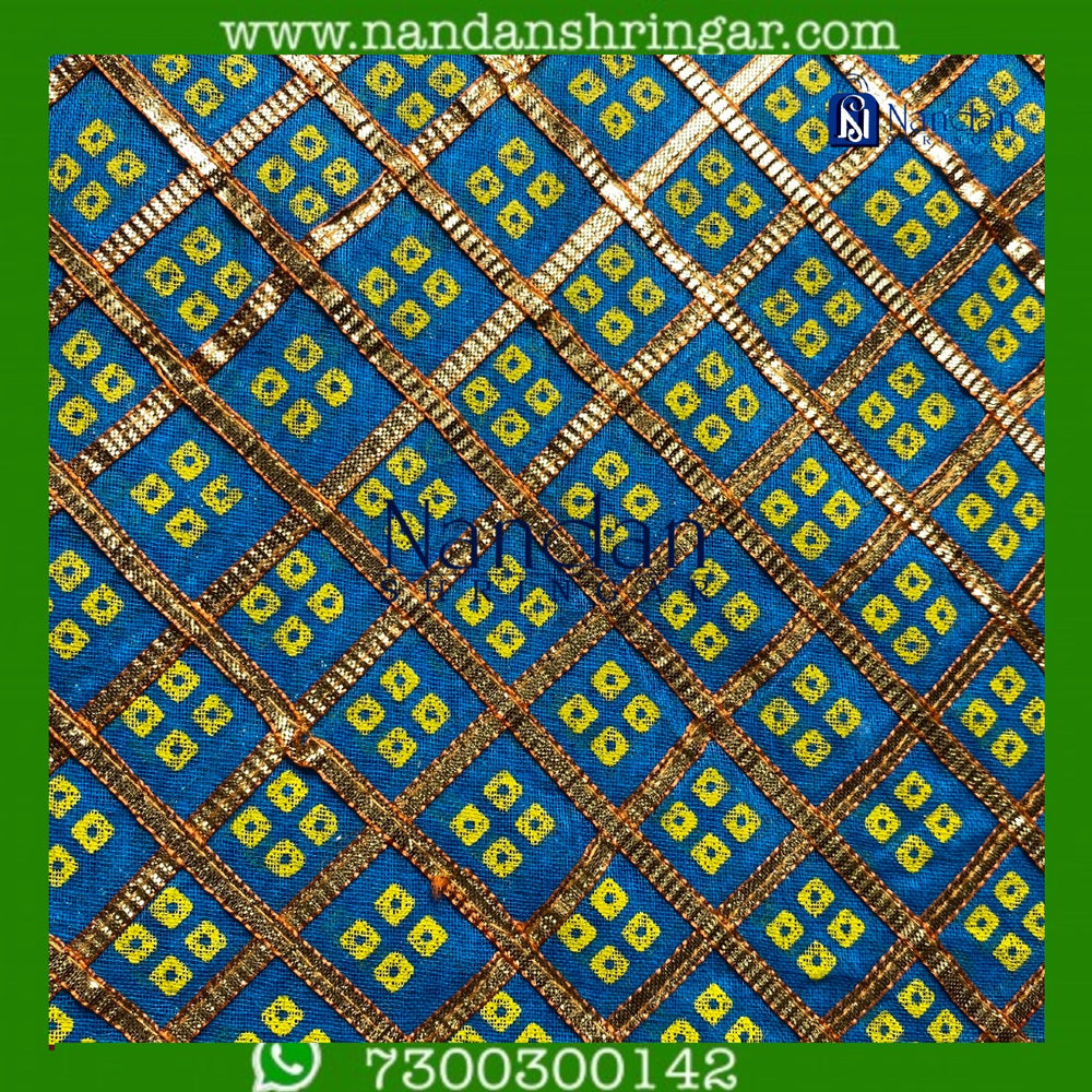 Blue Choufuli Checks Zari Vastra by nandanshringars, showcasing intricate check patterns and elegant zari detailing.