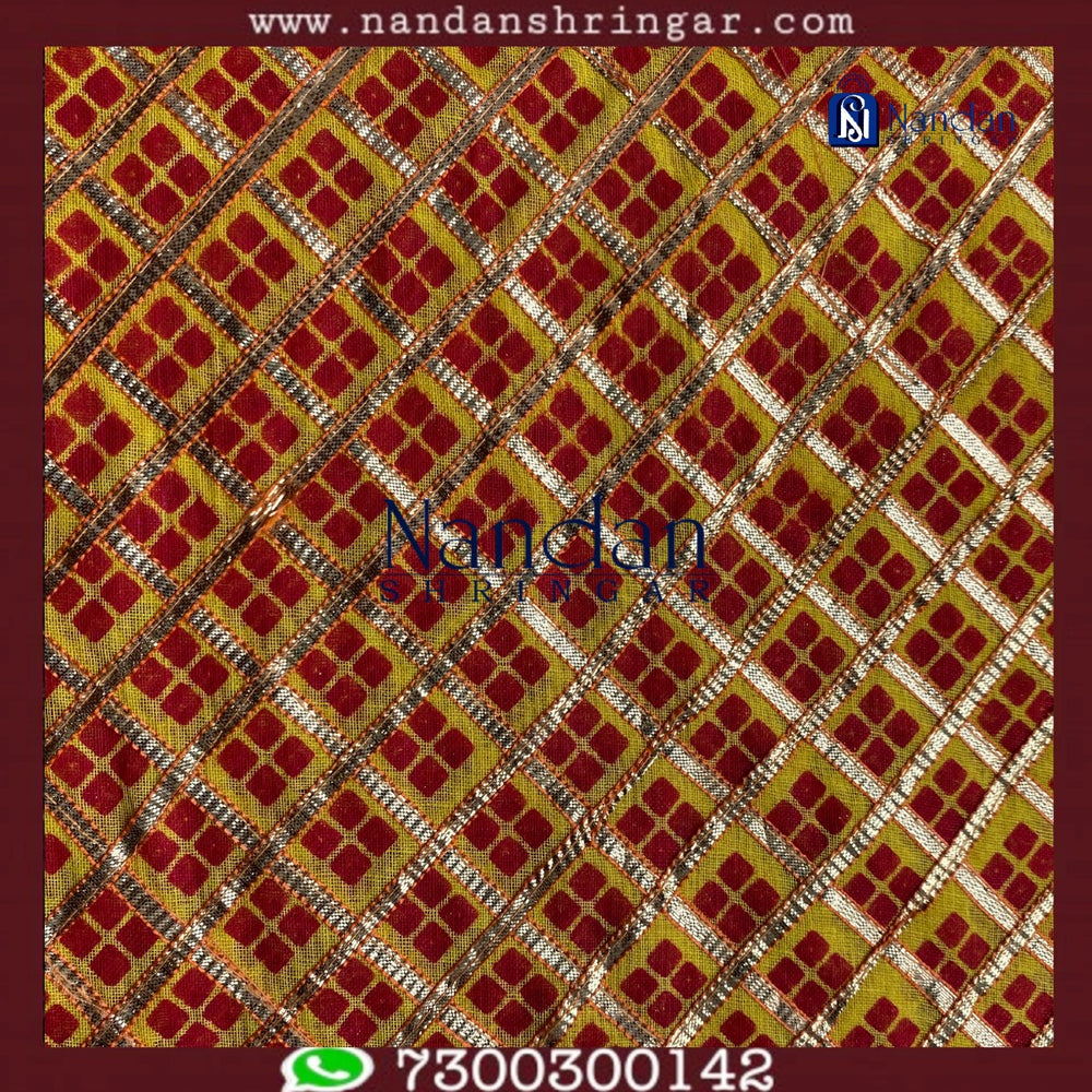 Red Choufuli Checks Zari Vastra fabric by nandanshringars with intricate checks and shimmering zari detail.