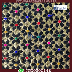 Multi-color designer zari vastra by nandanshringars, showcasing intricate patterns and elegant draping.