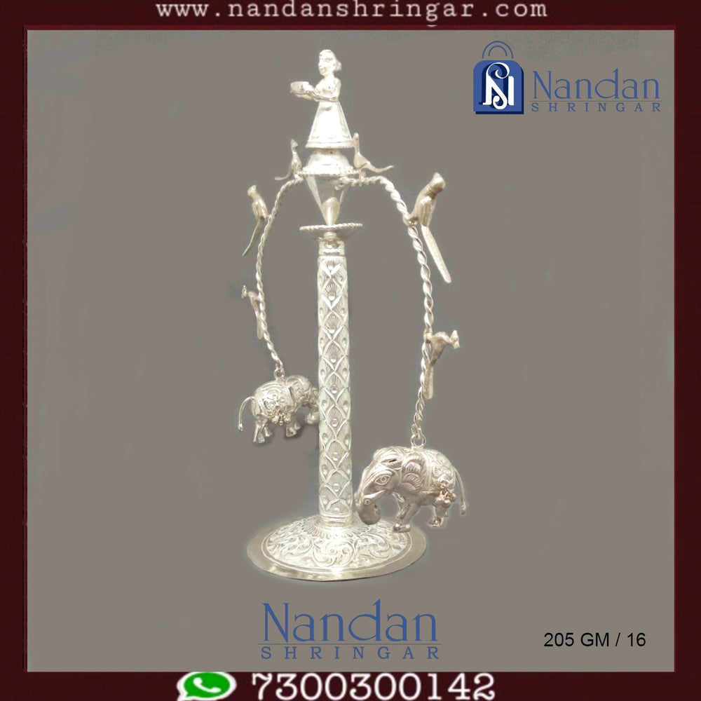 Fine silver Nandan Shringa Lalanji ornament by Utsav Arts, showcasing intricate design and craftsmanship.