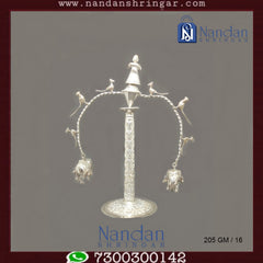 Fine silver Nat Gopi figure by Utsav Arts, showcasing intricate details and craftsmanship.