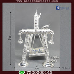 Fine silver Premium Carving Palna by Utsav Arts, showcasing intricate designs and a polished finish.