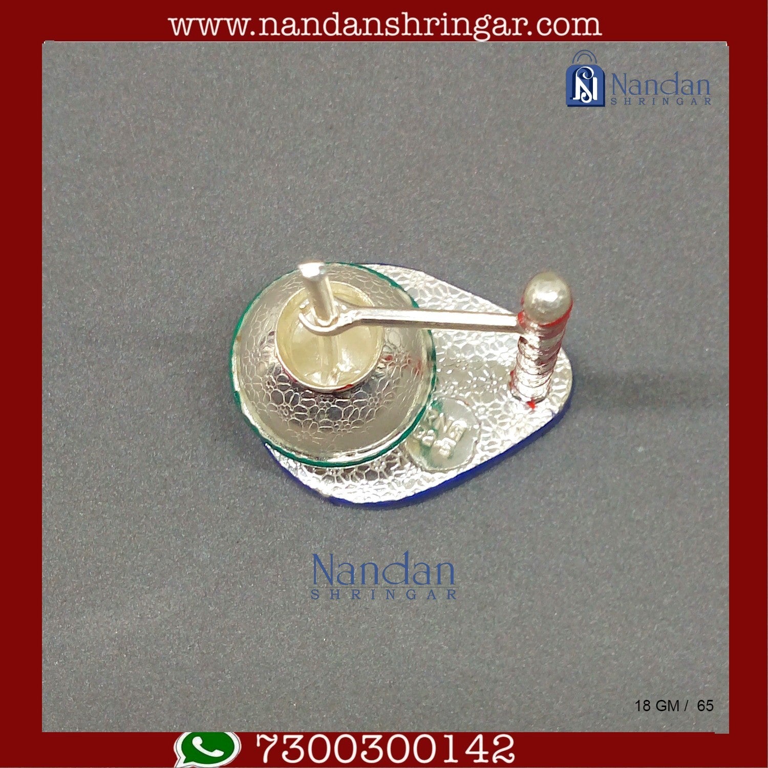 Bilona set in fine silver by Utsav Arts, showcasing intricate design and craftsmanship in elegant display.