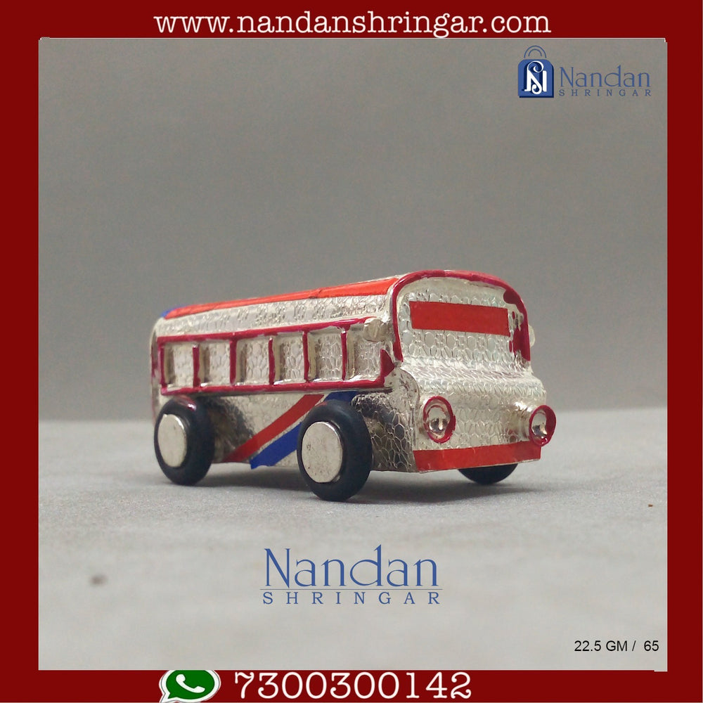 Fine silver bus sculpture by Utsav Arts, showcasing intricate detailing and craftsmanship.