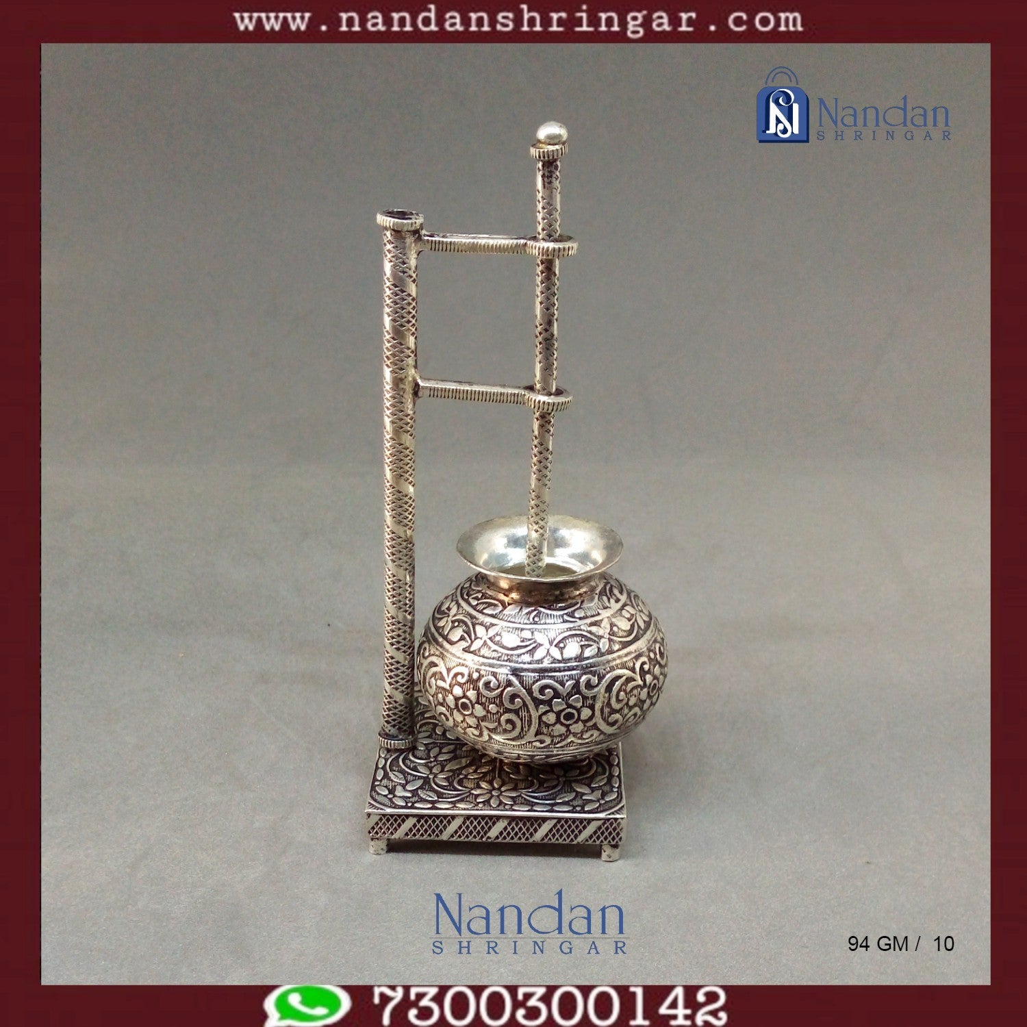 Fine silver carving Bilona set by Utsav Arts featuring intricate designs and elegant craftsmanship displayed on a soft background.