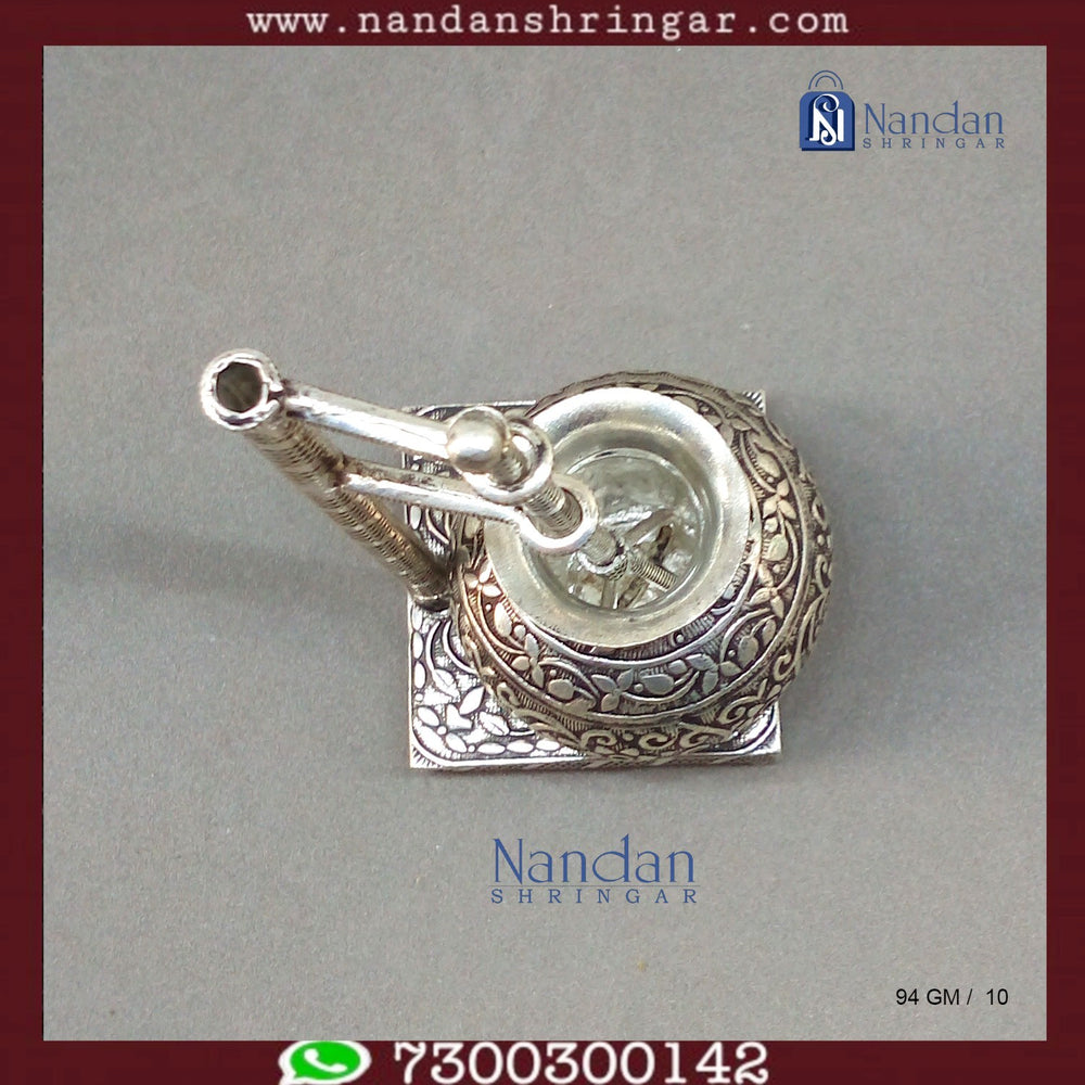 Fine silver carving Bilona set by Utsav Arts featuring intricate designs and elegant craftsmanship.