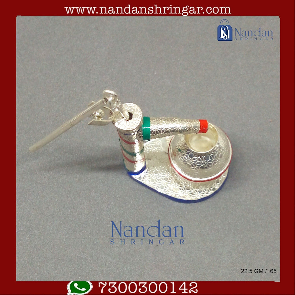 Fine silver hand pump by Utsav Arts, featuring intricate design and craftsmanship suitable for decorative use.