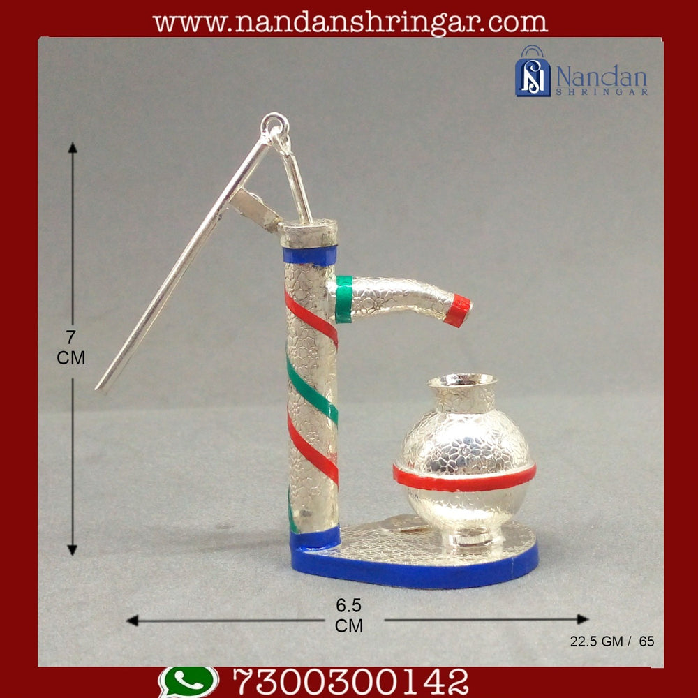 Fine silver hand pump by Utsav Arts, showcasing intricate craftsmanship and elegant design.
