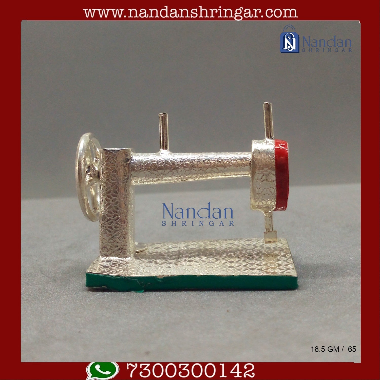 Fine silver Utsav Arts sewing machine with various stitching options displayed on a clean workspace.