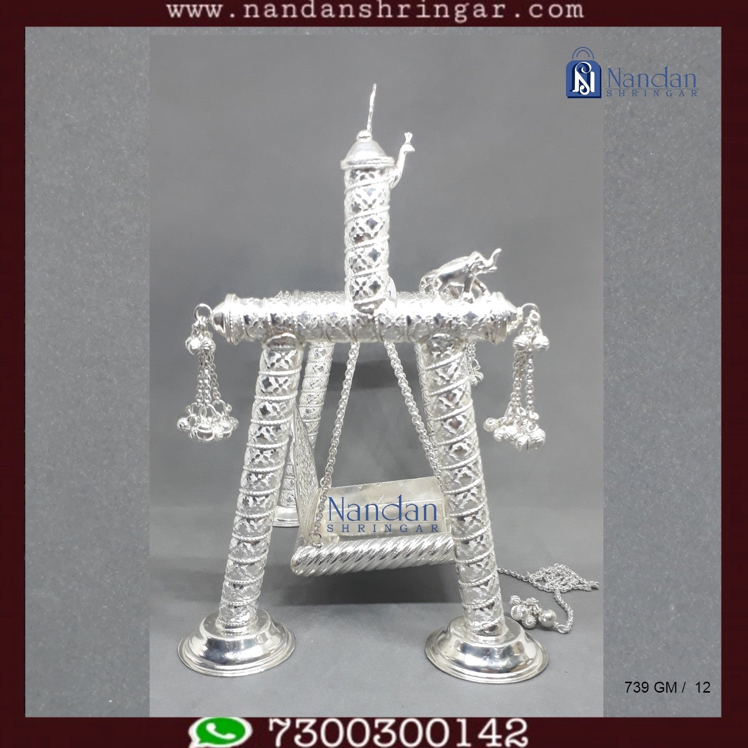 Premium fine silver carving palna by Utsav Arts, showcasing intricate designs and craftsmanship in a traditional style.