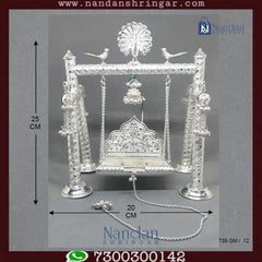 Premium fine silver carving palna by Utsav Arts, showcasing intricate designs and detailed craftsmanship.