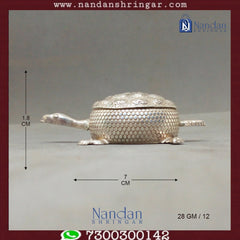 Fine silver tortoise figurine from Utsav Arts, showcasing intricate detailing and craftsmanship.
