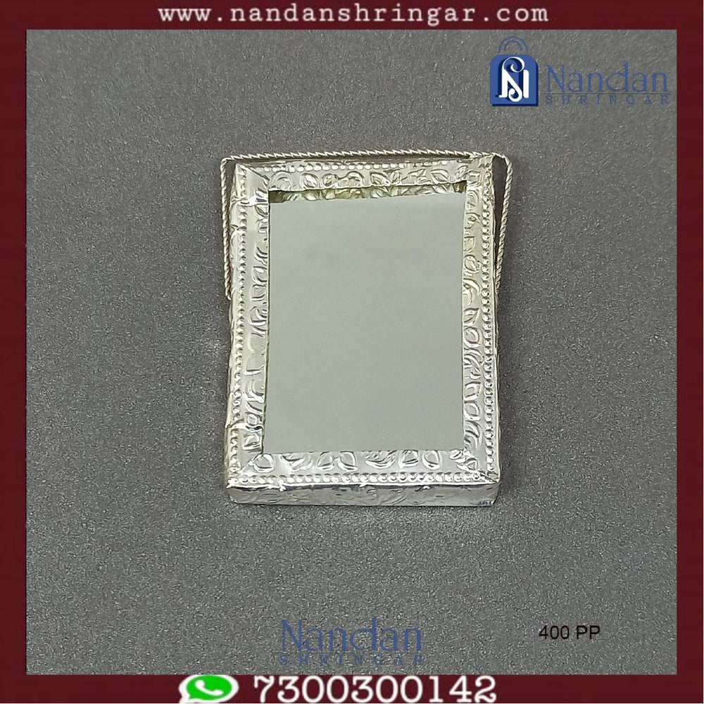 Silver Aarsi mirror from Utsav Arts, 4 cm, featuring intricate traditional design with fine silver craftsmanship.