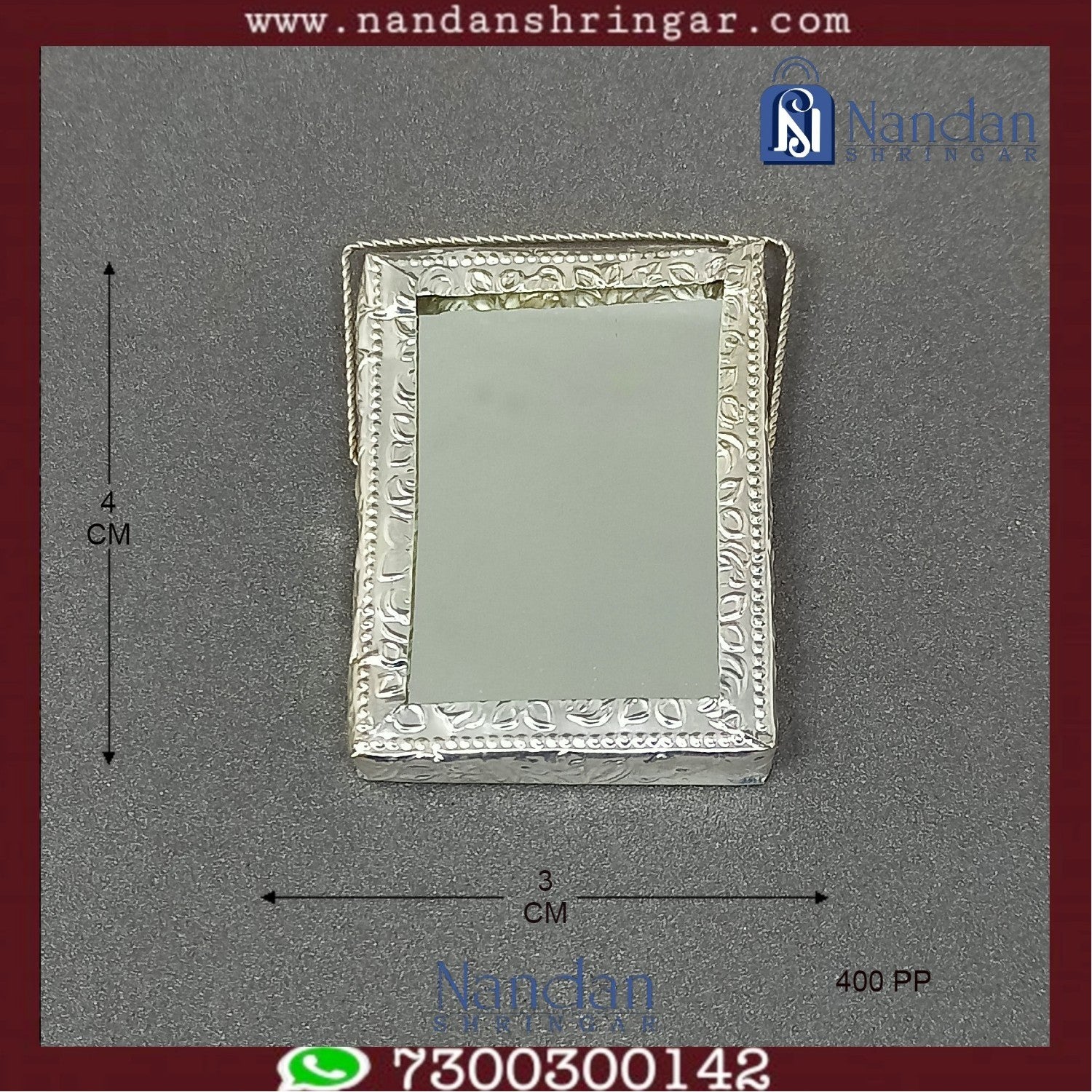 Small 4 cm fine silver mirror from Utsav Arts, featuring intricate traditional design, suitable for decorative or personal use.