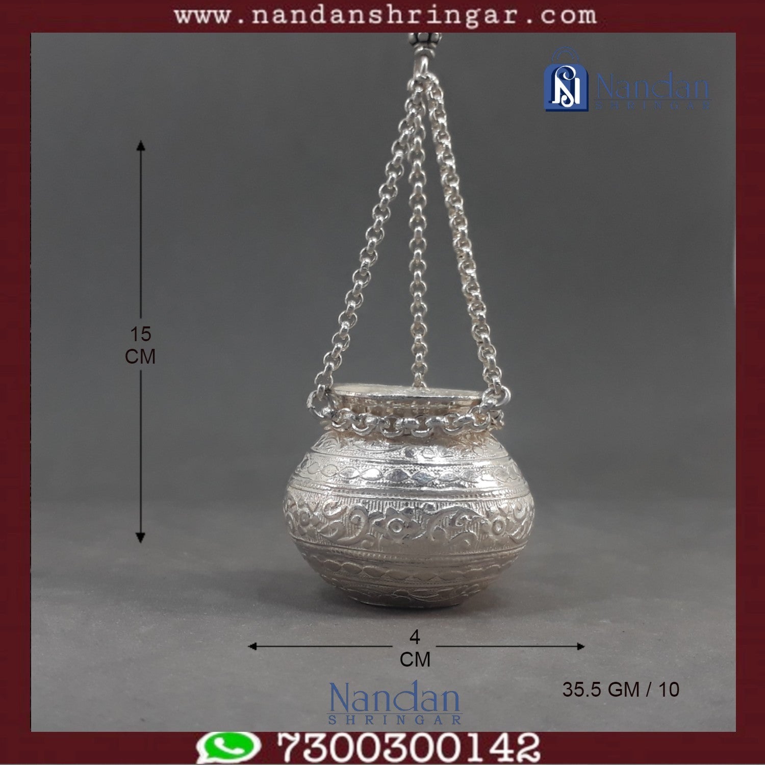 Fine silver hanging handi by Utsav Arts, showcasing intricate design and craftsmanship in a decorative style.
