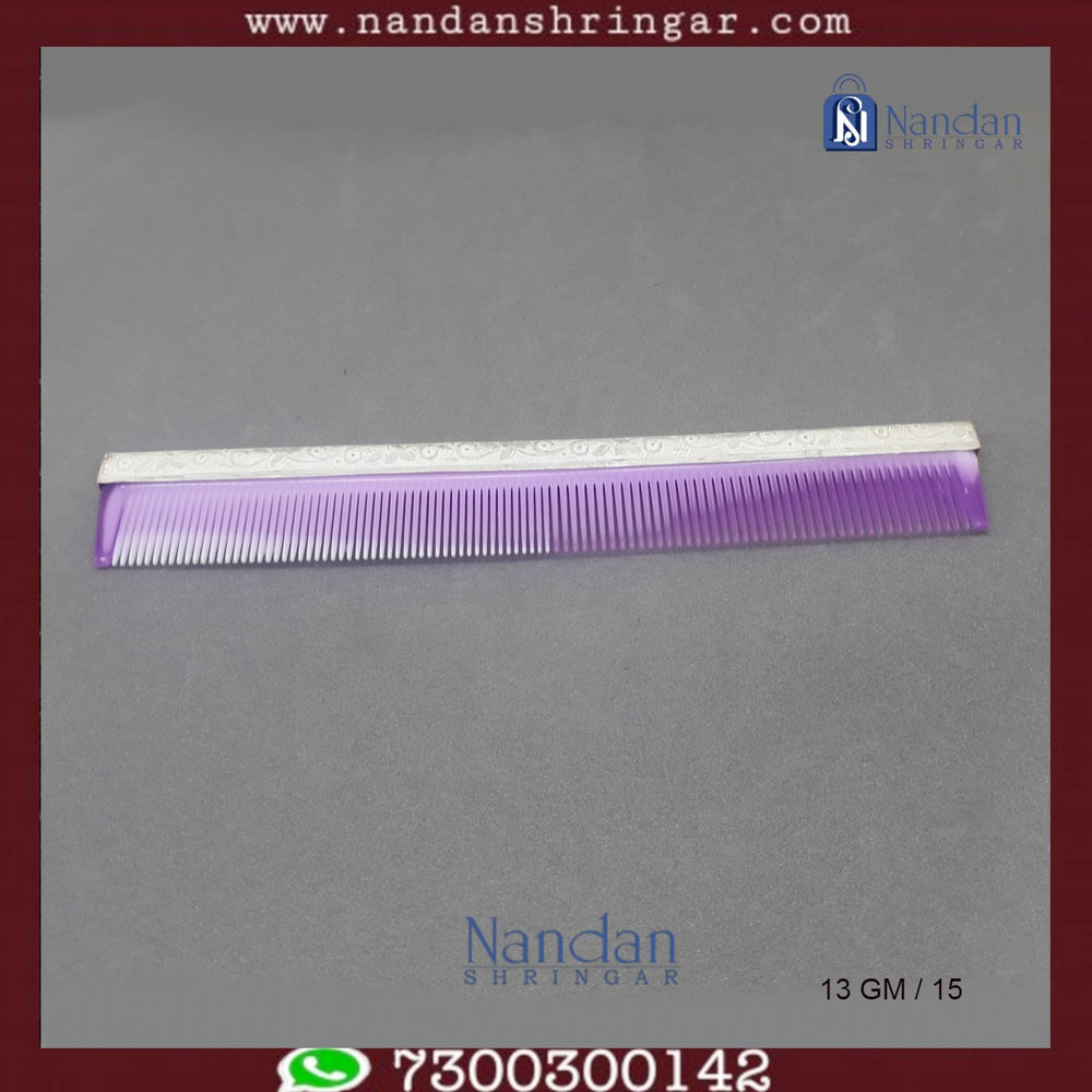 Fine silver comb by Utsav Arts featuring intricate design and smooth finish, ideal for styling hair.