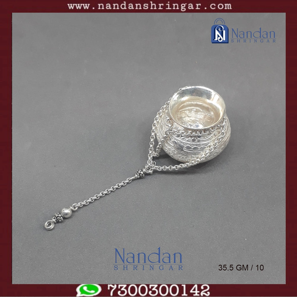 Fine silver Hanging Handi by Utsav Arts, featuring intricate designs and a traditional decorative style.