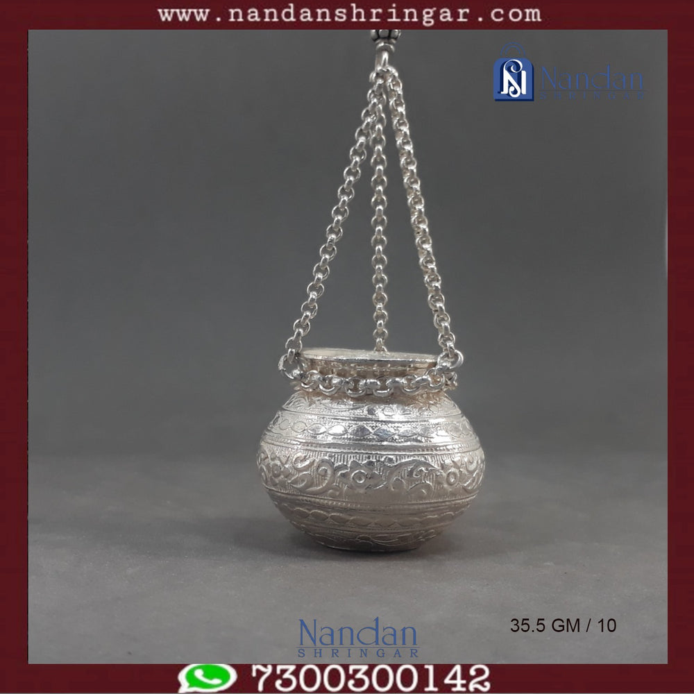 Fine silver hanging handi by Utsav Arts, featuring intricate designs and a polished finish, displayed against a neutral background.