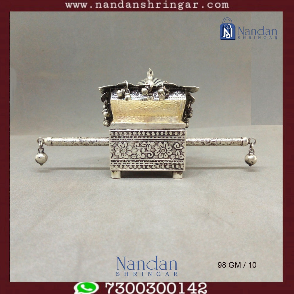 Mayur Doli Box by Utsav Arts in fine silver, showcasing intricate design and craftsmanship.