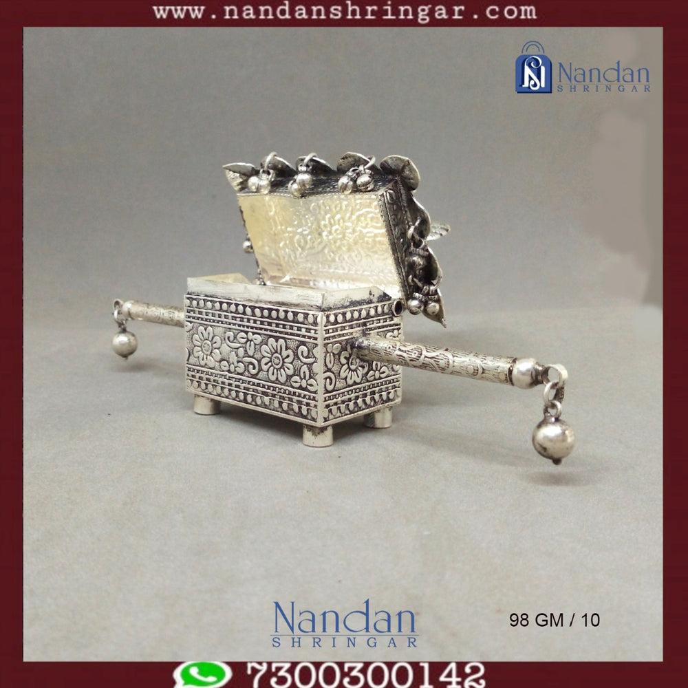 Fine silver Mayur Doli Box by Utsav Arts, showcasing intricate designs and elegant craftsmanship.