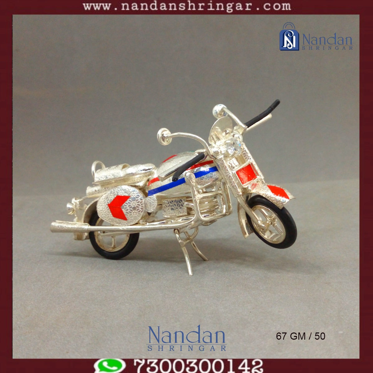 Fine silver motorcycle sculpture by Utsav Arts, showcasing intricate detailing and craftsmanship.