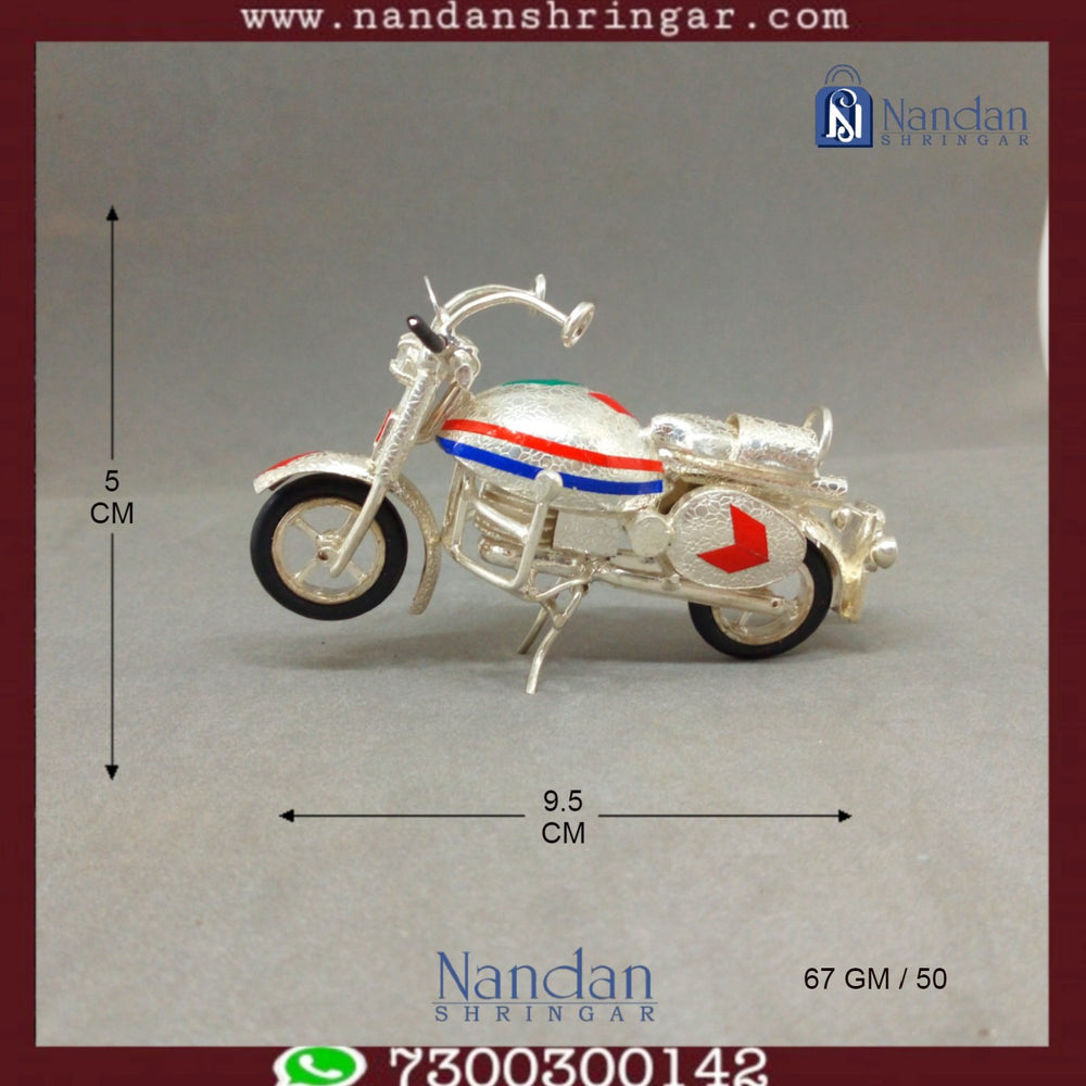 Fine silver motorcycle sculpture by Utsav Arts, showcasing intricate details and craftsmanship in a stunning design.